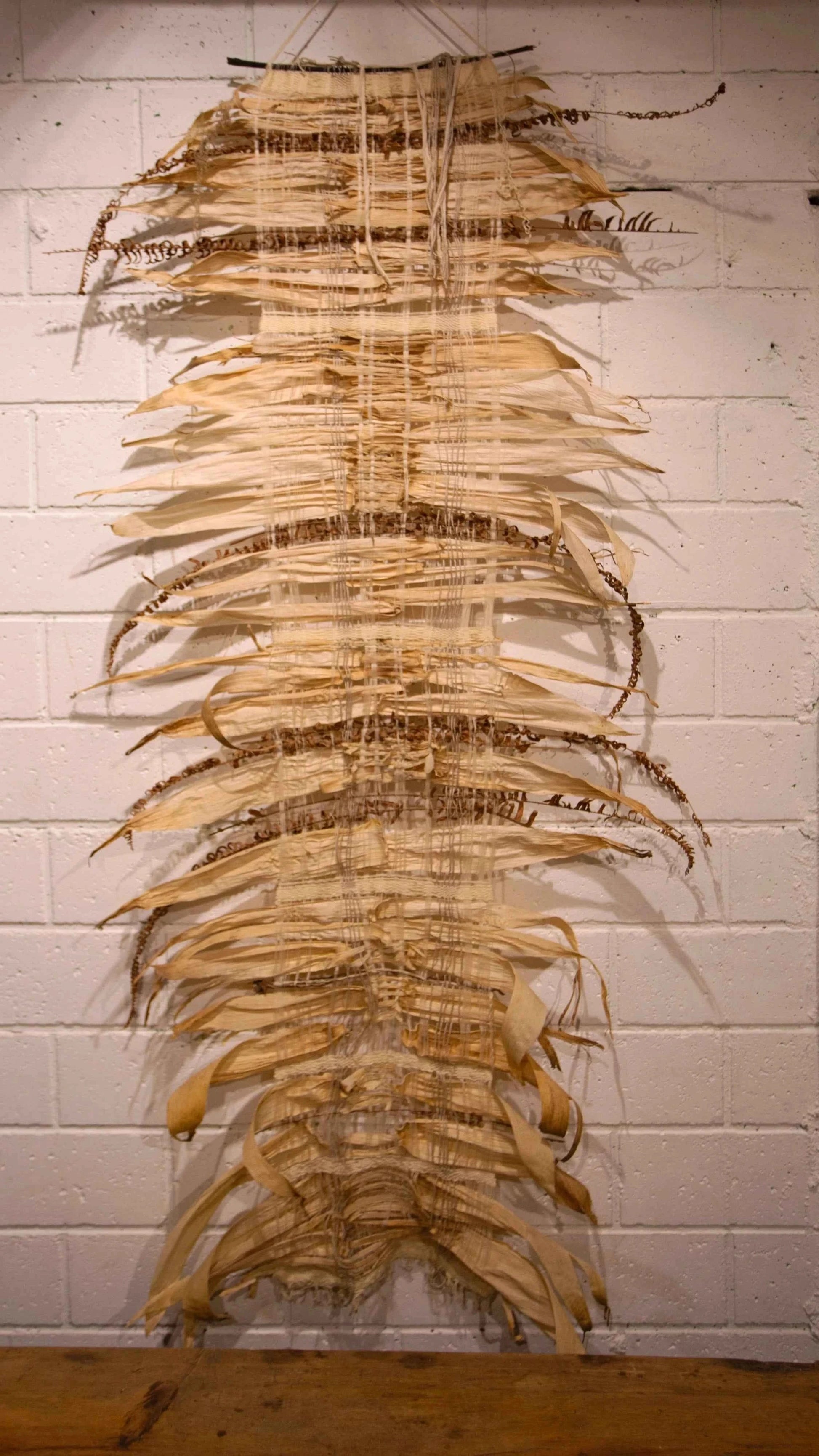 Awesome wall art made from natural corn leaves.