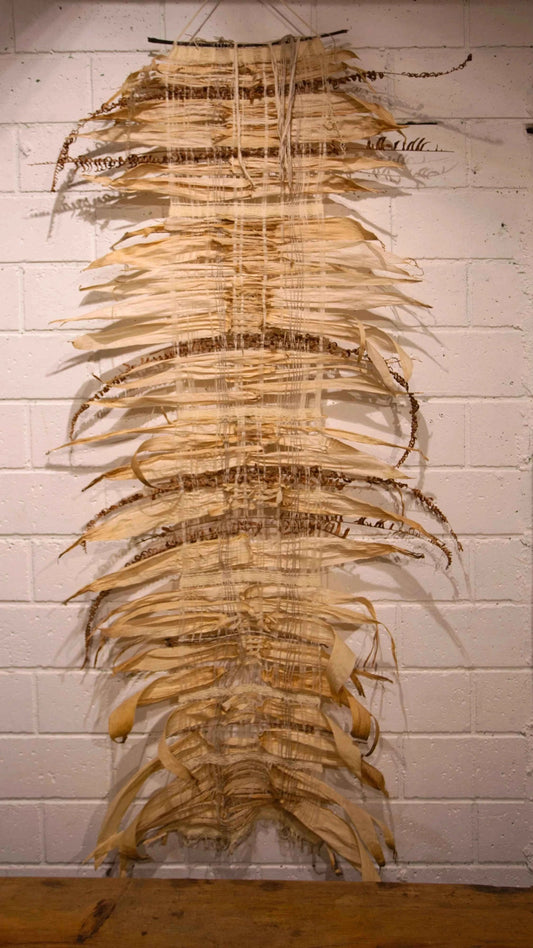 Awesome wall art made from natural corn leaves.
