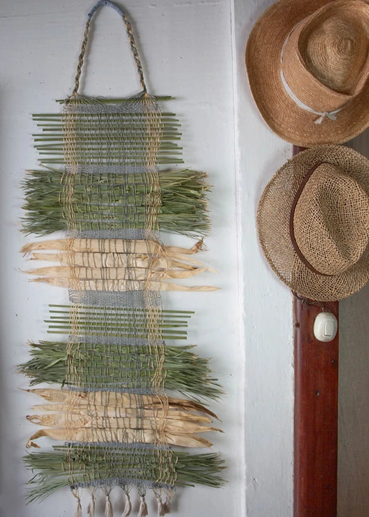 Unique piece of wall-art made with corn leavesand papyrus leaves at the Maia studio in Guatemala